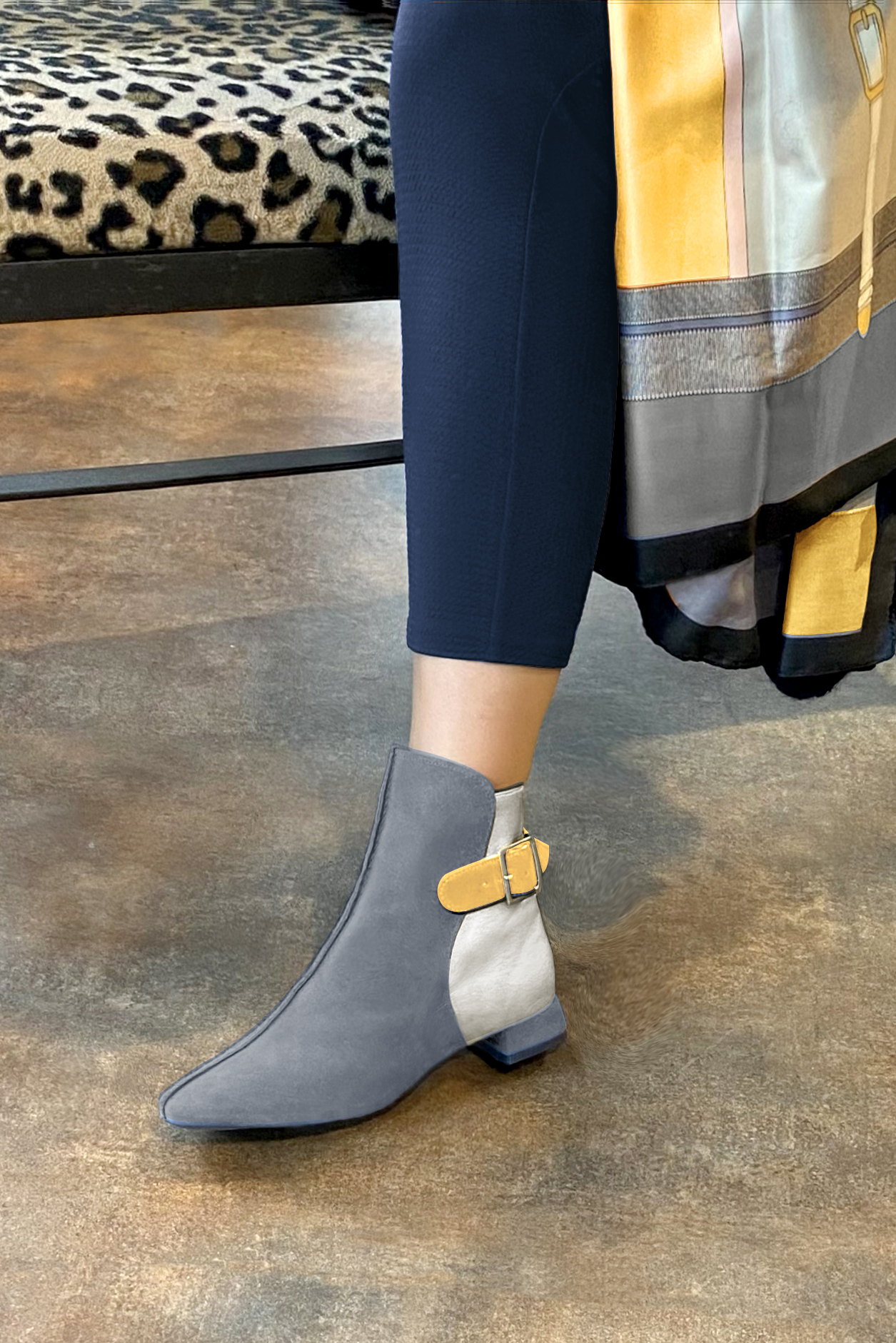 Mouse grey, light silver and mustard yellow women's ankle boots with buckles at the back. Square toe. Flat flare heels. Worn view - Florence KOOIJMAN